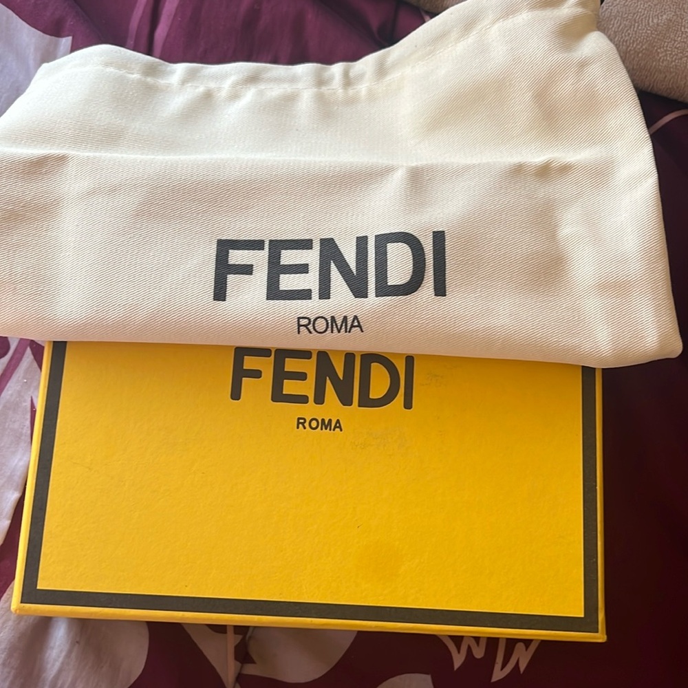 I’m selling this Fendi box and dust bag